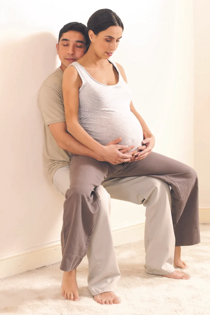 Partner support standing birth